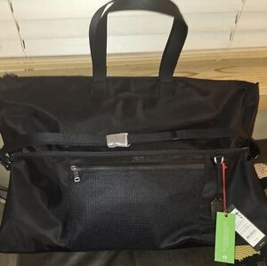 "Tumi black oversized yoga sling bag new with tag"